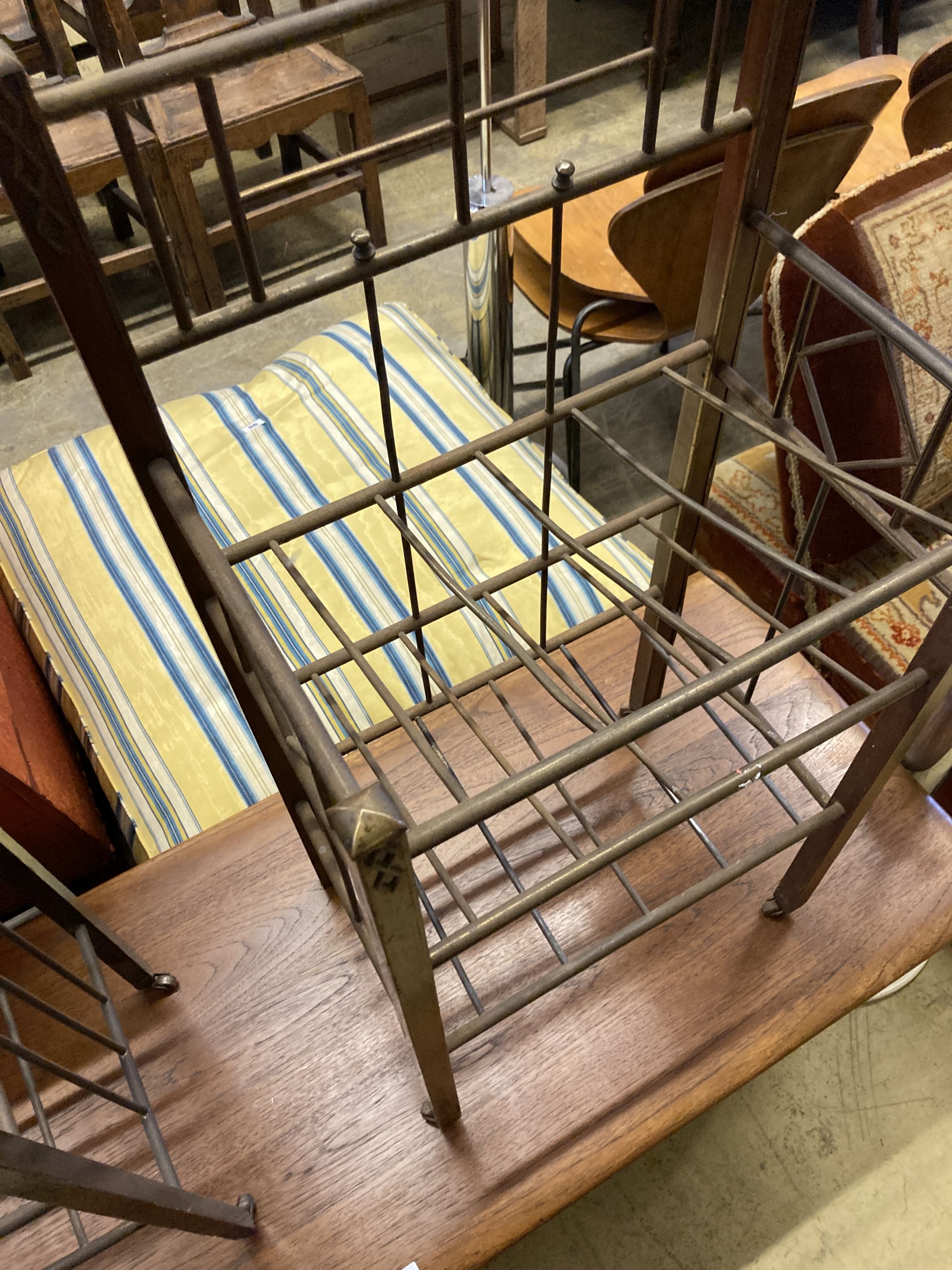 An early 20th century secessionist tubular brass and mahogany three tier newspaper stand, width 45cm, depth 32cm, height 93cm